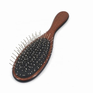 Cepillo <span class=keywords><strong>de</strong></span> masaje <span class=keywords><strong>de</strong></span> plástico <span class=keywords><strong>de</strong></span> color madera, cepillo <span class=keywords><strong>de</strong></span> pelo <span class=keywords><strong>de</strong></span> paleta ovalada <span class=keywords><strong>de</strong></span> metal, para <span class=keywords><strong>enredos</strong></span> húmedos, venta al por mayor - Product Image 1