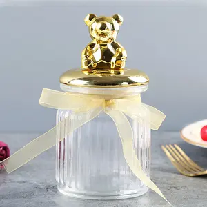 Gift item 230ml airlight gold animal lid glass storage candy glass jar with ceramic lid