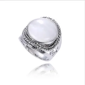 European and American fashion retro wild hollow rings jewelry new simple white oval opal stone ring men