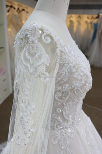 <span class=keywords><strong>Lungo</strong></span> maniche <span class=keywords><strong>in</strong></span> <span class=keywords><strong>tulle</strong></span> <span class=keywords><strong>con</strong></span> taiwan del merletto che borda UNA linea pannello esterno abiti da sposa per la sposa 2019 - Product Image 4