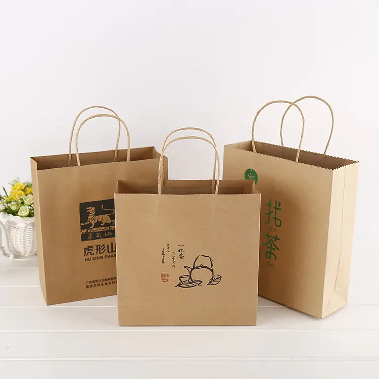 Top sale recyclable Customized Kraft paper gift bag with Printed twisted handles