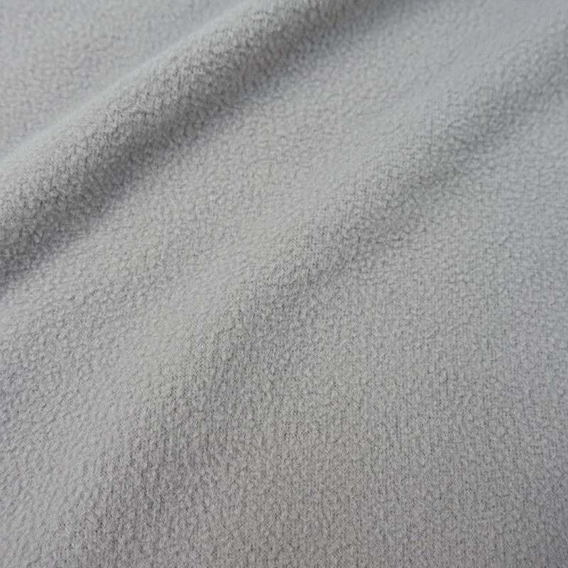 Одна сторона щебень удобные трикотажные 100 полиэфирный флис ткань для одежды