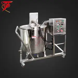 Mixing paraffin wax melting tank with filling