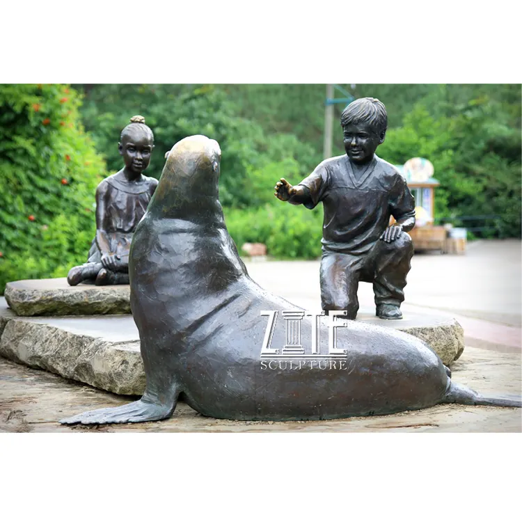 Bronze เด็ก boy และสาวเล่น dolphin ประติมากรรม