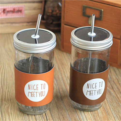 Haonai glass mason jar with split metal lid,stainless steel straw and PU cover,500ml drinking glass jar.
