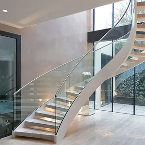 Escalera curva de lujo con diseño de pasamanos de cristal sin marco