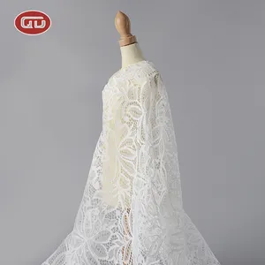 Wholesale cheap garment polyester white elegant customized cord lace fabric