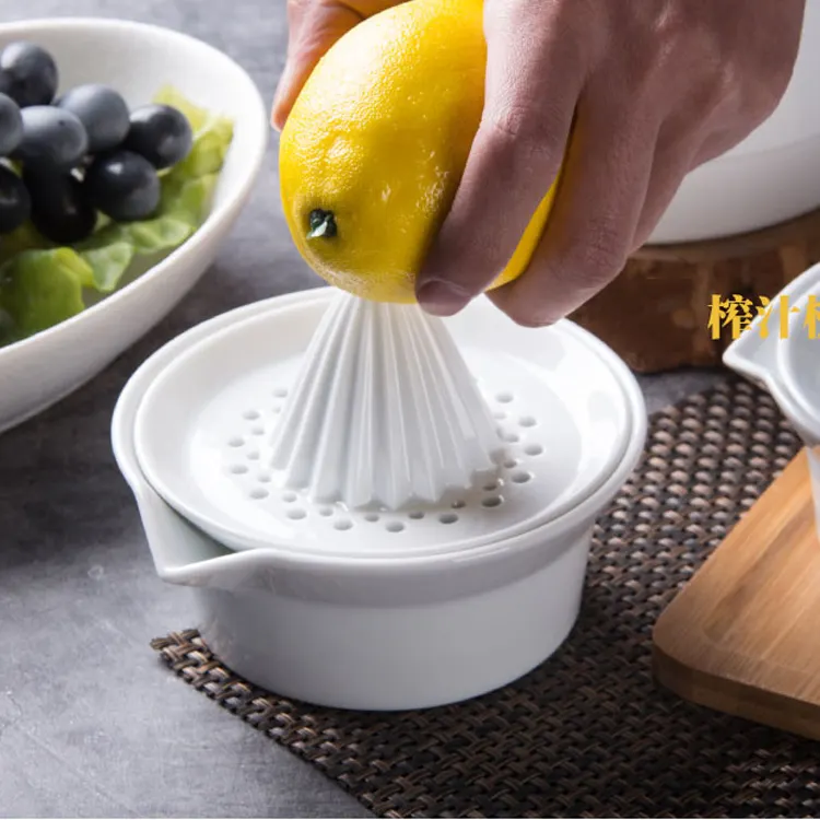 家庭用キッチン用中国スタイル高品質ホワイト施釉フルーツオレンジセラミックジューサー