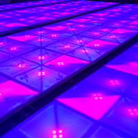 Plancher de danse à projection DMX RGB coloré en ABS, effet spectaculaire, éclairage de scène Guangzhou, IP33, activé par le son, pour événements de mariage