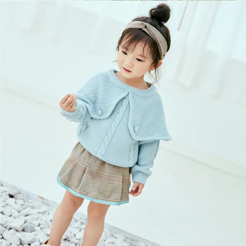 Best quality casual solid color baby knitted cable cloak poncho pullover warm girls holiday sweater with pompons