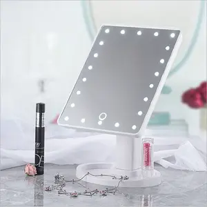 Espejo de maquillaje con luz LED de doble cara compacto de Venta caliente para escritorio con función de bolsillo para uso cosmético