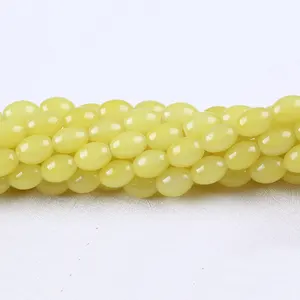 Perle di vetro di forma ovale lucidate lisce gialle chiare di buona qualità