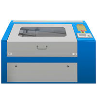 STOCK UE NOUVEAU 3050 50W MACHINE DE GRAVURE ET DE DÉCOUPE LASER CO2 POUR MÉTAL ET CUIR AVEC UN ESPACE DE TRAVAIL DE 300x500MM