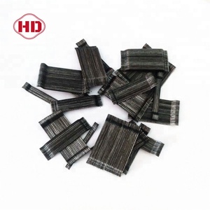 Construcción y material de construcción enganchado pegado al carbono fibras de acero