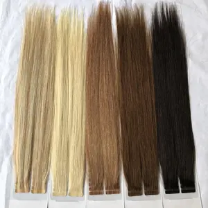 Black color straight 40 pcs per pack remy tape hair extension wholesale price indian raw temple hair