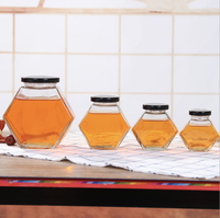 Bocal à miel hexagonal en verre de 250 ml (250 g) au design élégant avec couvercle doré, pot hexagonal en verre de 250 g pour miel avec couvercle métallique scellé