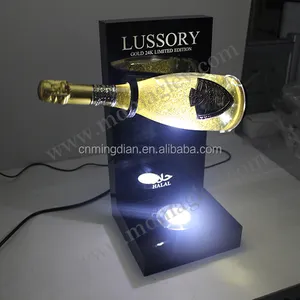 Soporte de exhibición giratorio de botella de vino de oro brillante iluminado acrílico para expositor