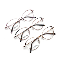 Stock listo de Diseño de Moda de titanio anteojos ópticos marcos