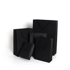 Yüksek kaliteli Kraft kağıt özelleştirilmiş siyah kağıt torba pamuk saplı