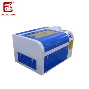 Julong 6040 laser engraving machine and new design laser cutting machine Carved glass,Carving jeans, cloth, making handicrafts