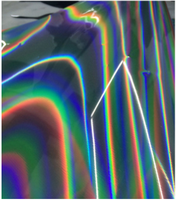 Découpe électronique de transfert de chaleur réfléchissant hologramme arc-en-ciel Film découpé au laser reflétant le fer sur vinyle élastique TPU pour étiquette de vêtements