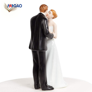 Leaning on a globus kiss statuette couple ceramics wedding cake toppers - Product Image 3