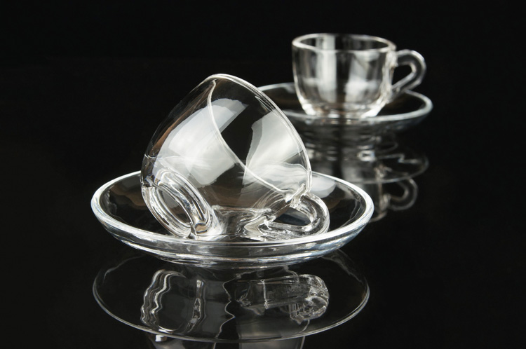Clear glass coffee cup set with handle and saucer
