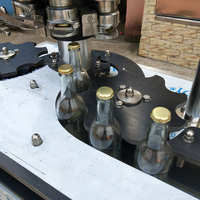 Machine de bouchage automatique à grande vitesse pour bouteilles en verre, lait, jus, bière