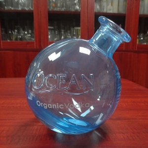 Botella de <span class=keywords><strong>Vodka</strong></span> Ocean de 1 Litro, Forma de Bola, Vidrio <span class=keywords><strong>Azul</strong></span>, 1000 ml, con Fondo Inclinado - Product Image 1