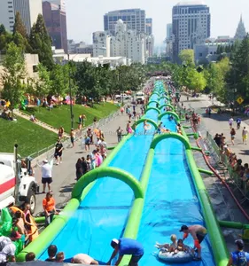 अनुकूलित 1000FT पीवीसी विशाल Inflatable पानी स्लाइड वयस्कों के लिए मामला शहर