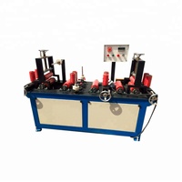 Machine de laminage et d'enrobage de profilés en aluminium