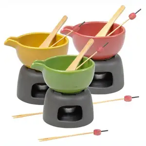 elegant ceramic raclette and fondue set with fork for cheese and chocolate porcelain melting pot promotion