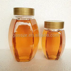 Wholesale 1KG Glass Honey bottle/Honey packing jar with metal golden lid