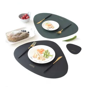 Popular irregular shaped custom logo artificial leather table plate mat and coasters set classic non-slip pvc placemat