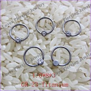 [ST-518] Haute Polissage ASTM F136 Gr23 Titane Bagues Captives Avec Disque Plat Pressé Gemme - Product Image 1