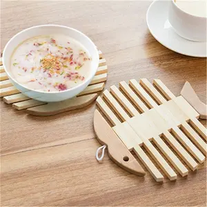 2024 China Leverancier Goedkope Groothandel Tafeldecoratie Cup Pot Pad Coaster Anti-Hot Bakmat Visvormige Bamboe Placemats