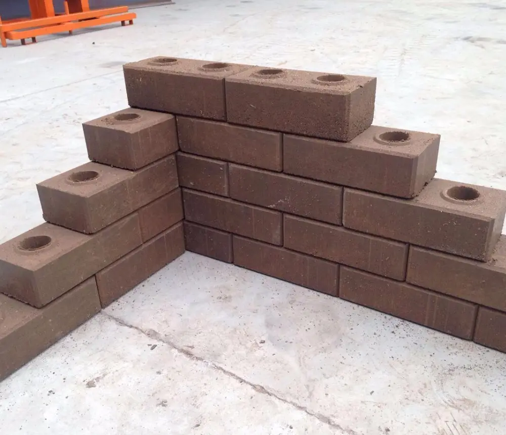 Logotipo da máquina de fabricação de tijolos, blocos de bloco da terra de argila comprimida manual HBY2-15 do solo vermelho