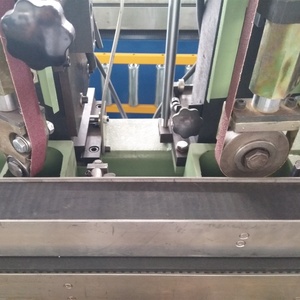 Machine à conversion à courroie Abrasive, machine de ponçage en continu avec pulvérisation automatique de colle et épissure de bande - Product Image 6