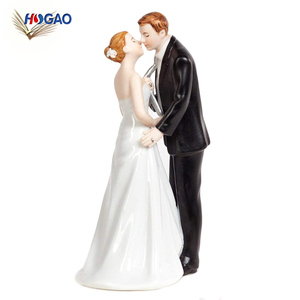 Leaning on a globus kiss statuette couple ceramics wedding cake toppers - Product Image 2