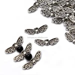 顶级品质 7 x 22毫米蝴蝶翅膀款式 #2 西藏银色金属垫片珠每袋 50 件珠宝制作结果