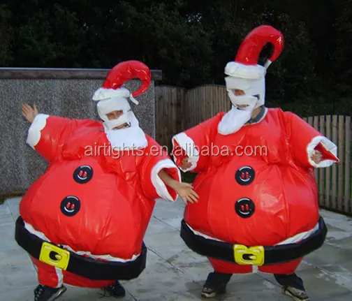 Смешные рождественские костюмы с Санта Клаусом, спортивная игра с Санта-борцом