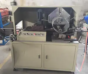 Machine de fabrication de tubes spiralés à mailles expansées pour filtre à air HDAF