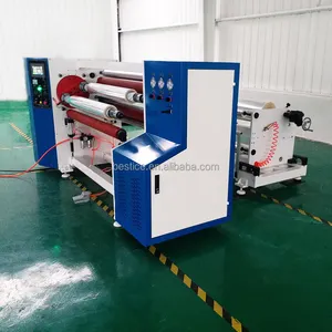 Automatic roll rewinding machine with twin shafts exchange