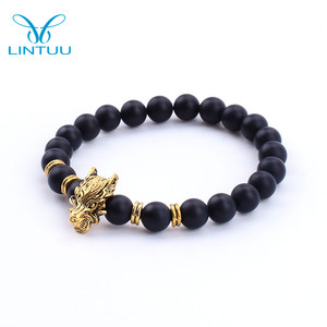สร้อยข้อมือจี้มังกรจีนสร้างแรงบันดาลใจให้กับจักรราศีสร้อยข้อมือจักรราศีทำจากโลหะผสมทางเรขาคณิตชาติพันธุ์พร้อมโอนิกซ์สำหรับวันครบรอบ