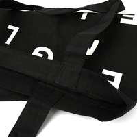 Sacs à chaussures réutilisables promotionnels sacs à provisions fourre-tout en toile noire personnalisée en coton recyclé avec lettres blanches imprimées