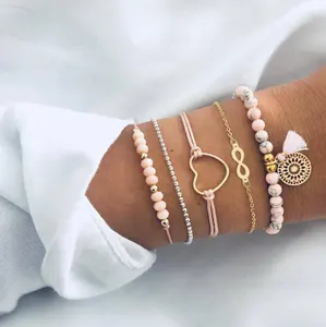 5 unids/set mujeres puro Costa vida Boho playa de Surf Femme de la onda hecho a mano pulsera de encantos de la onda cuerda cera cadena conjunto de pulsera