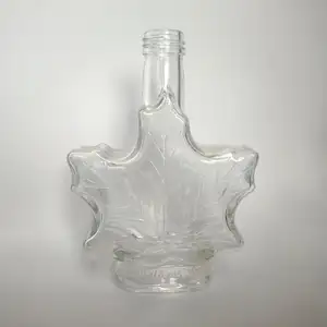 Bouteille en verre de 50 ml, 100 ml, 250 ml en forme de feuille <span class=keywords><strong>d</strong></span>'<span class=keywords><strong>érable</strong></span> canadienne pour <span class=keywords><strong>sirop</strong></span> <span class=keywords><strong>d</strong></span>'<span class=keywords><strong>érable</strong></span>/vin glacé/<span class=keywords><strong>whisky</strong></span> - Product Image 1