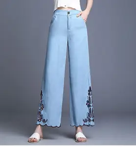 2019 Professional made summer fashion light blue pants hollow embroidered silk jeans women wide leg pants