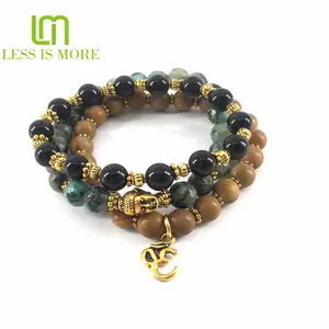 Türkis, Holz, Onyx Edelstein mit Gold OM Yoga Buddha Armbänder Natürlicher trend iger Buddhismus PE Tasche Perlen Armbänder Achat Bild