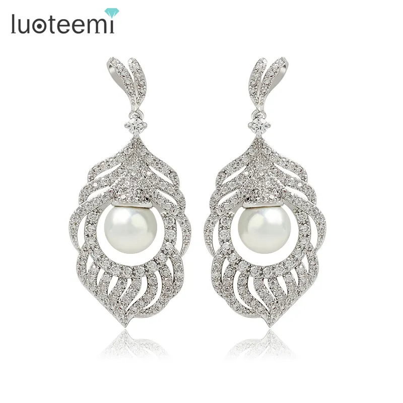 LUOTEEMI de lujo AAA Cubic Zirconia Micro pavimentado Concha perla mar pluma pesada pendientes de novia Sexy joyería de las mujeres